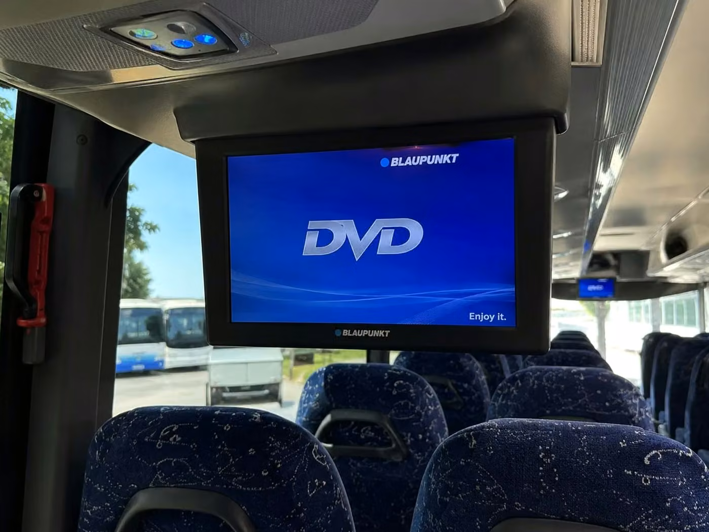 lima 56 passenger charter bus tvs