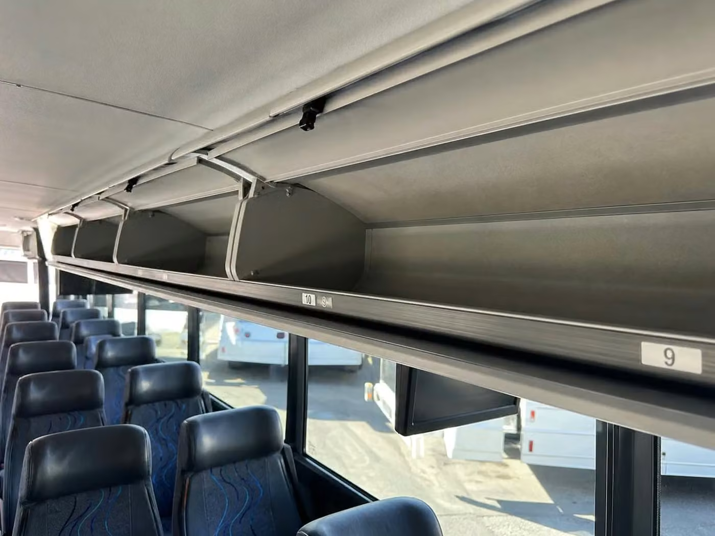 lima charter bus overhead storage